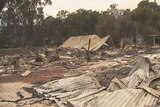 The remnants of destroyed buildings in Yarloop lie scattered after a bushfire.