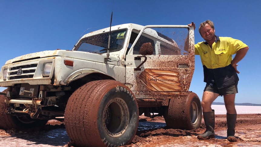 Muddy four-wheel-drive on salt lake