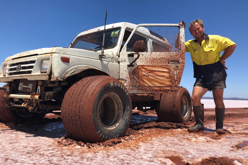Muddy four-wheel-drive on salt lake