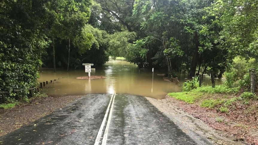 A flooded road over Behana Creek near Cairns
