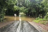 A flooded road over Behana Creek near Cairns