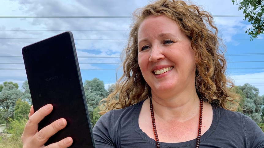 A woman on a tablet