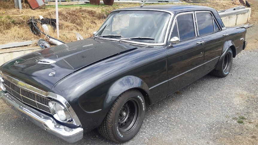 Peter Green's restored 1964 Ford Falcon XM - a long dark muscle car