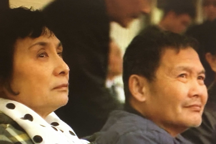 The parents of Brighton siege victim Nick Hao at a memorial in Mount Waverly.