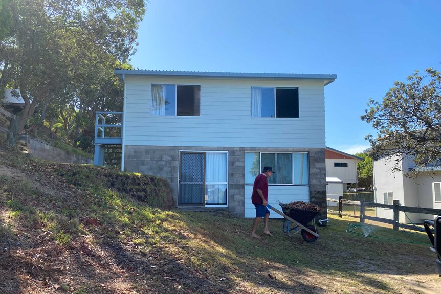 Happy Valley homeowner John Walker prepares his property