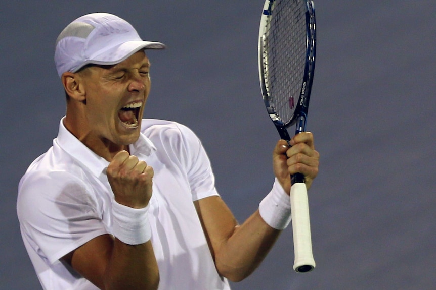 Another scalp ... Tomas Berdych celebrates after beating Roger Federer.