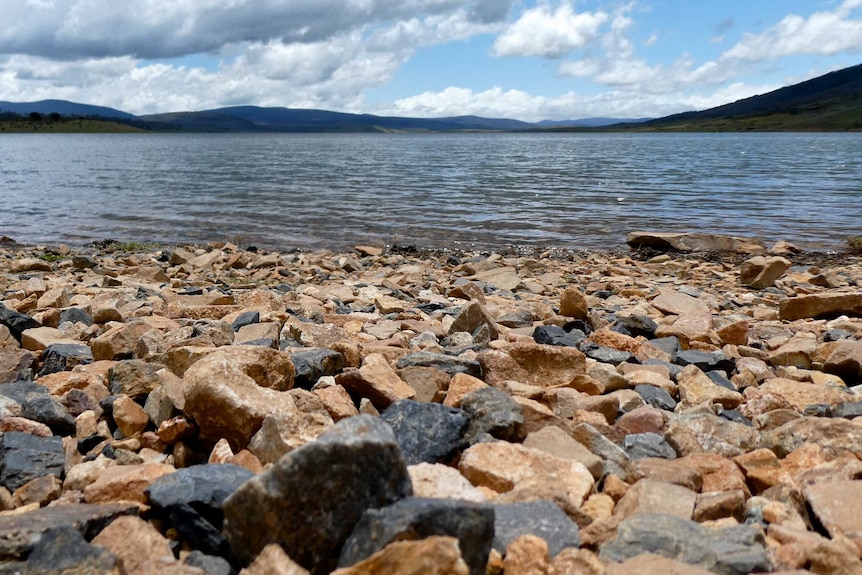 Rocks in front of a dam in the Snowy Mountains