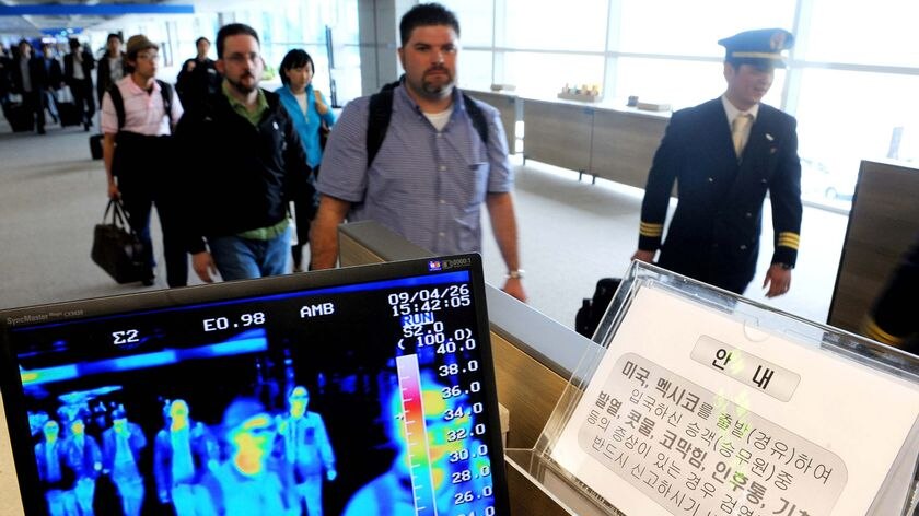 Thermal scanners are due to arrive in Brisbane, Gold Coast and Cairns international airports on Thursday to check passengers as they disembark.