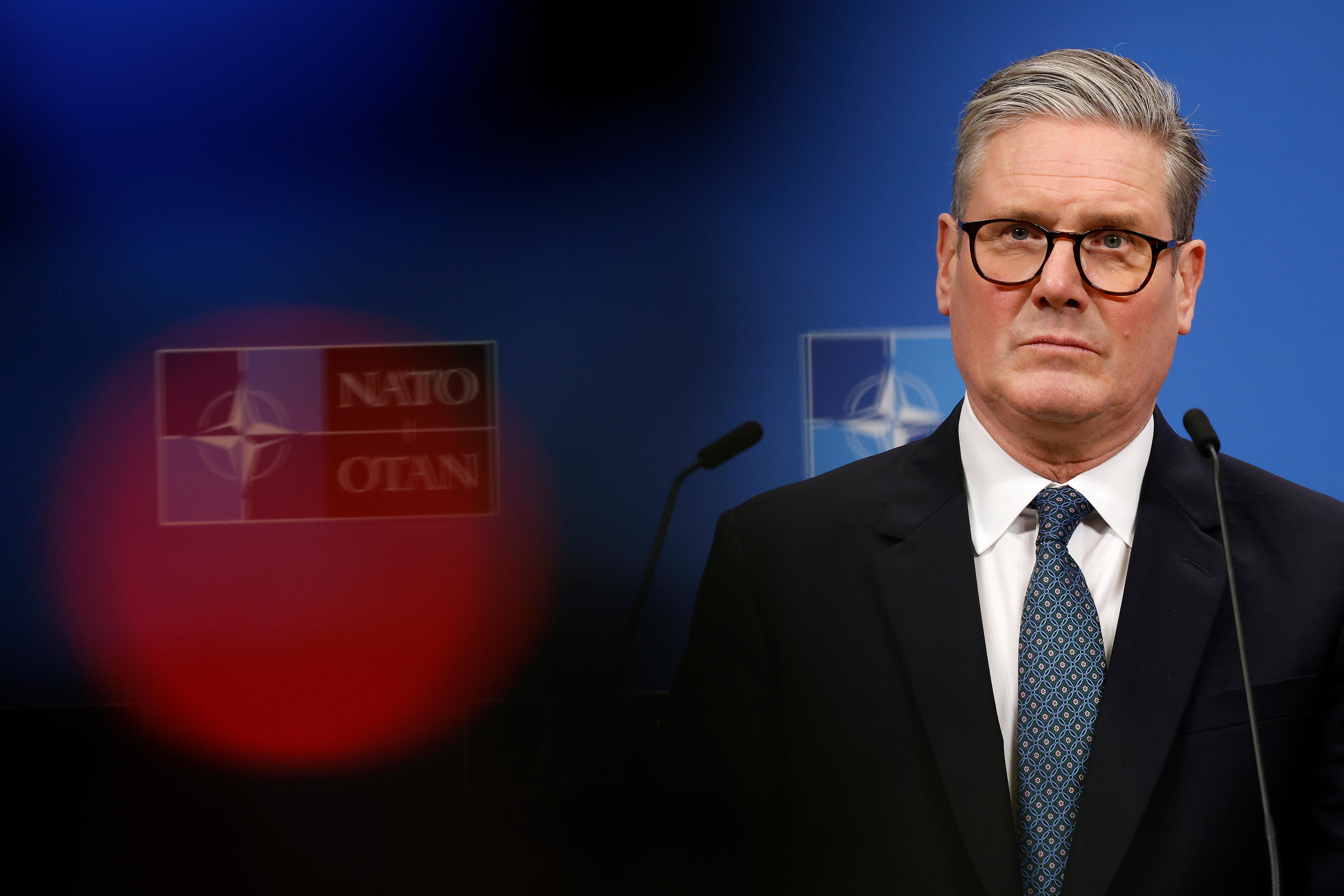 A close up picture of Britain&#39;s Prime Minister Keir Starmer at a NATO press conference.