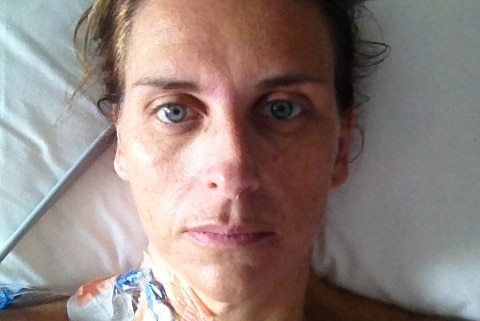 A portrait picture of Liza Stearn recovering in hospital after a SCAD attack.