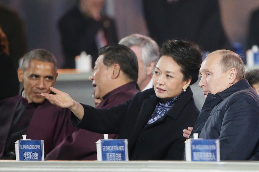 Vladimir Putin, Peng Liyuan, Xi Jinping and Barack Obama.