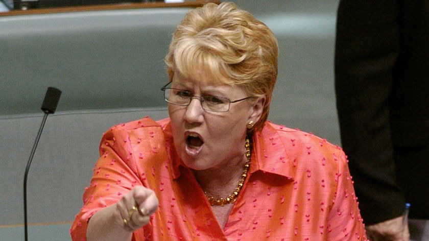 Julia Irwin points in Parliament
