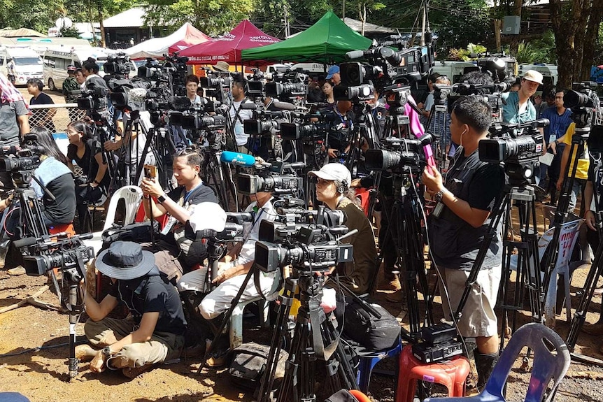 The cameras of the world's media set up, ready for the latest details of the rescue.