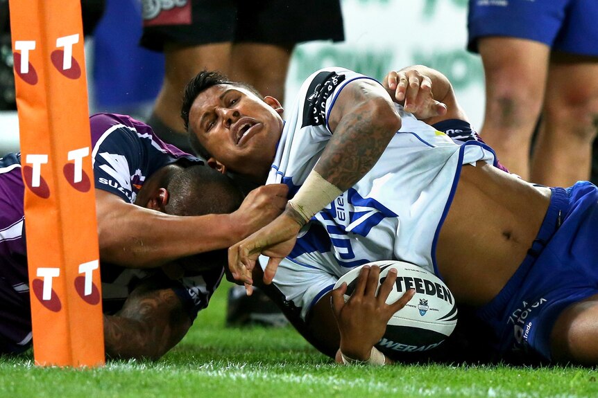 Ben Barba of the Bulldogs is taken into touch during the 2012 NRL grand final.