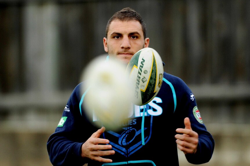Robbie Farah catches a ball at NSW training.