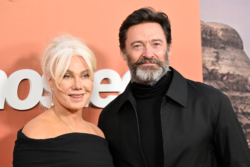 Hugh Jackman, right., and Deborra-Lee Furness Jackman attend a movie premiere.