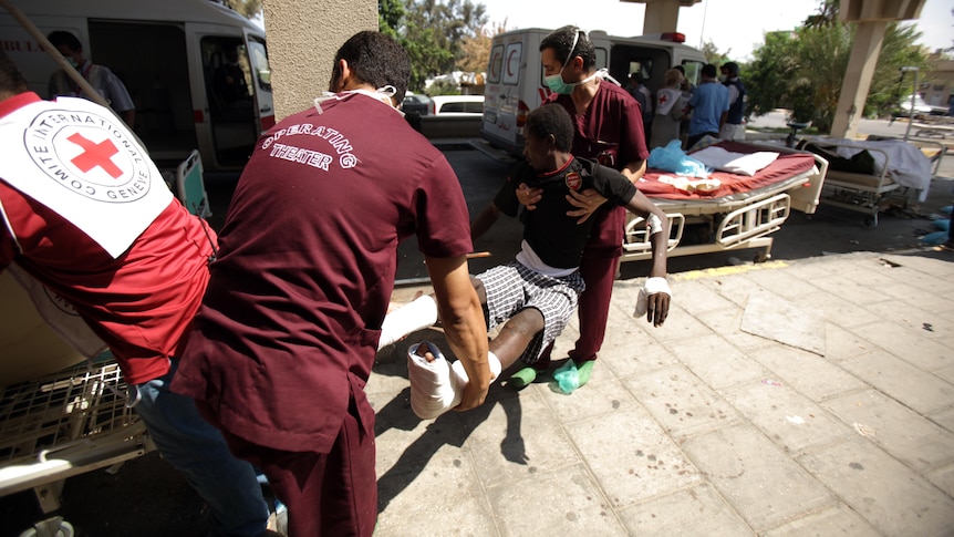 In Tripoli, scores of people are arriving at hospitals every day with gunshot wounds