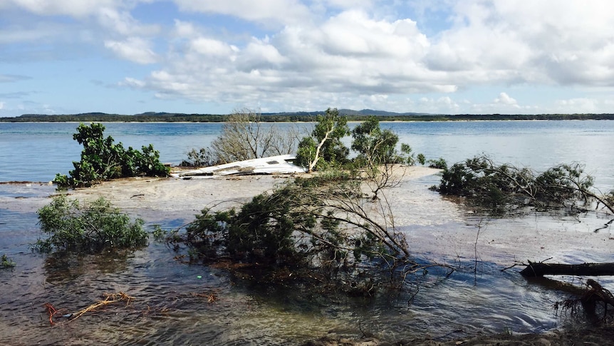 A submerged caravan in the sinkhole at Inskip Point