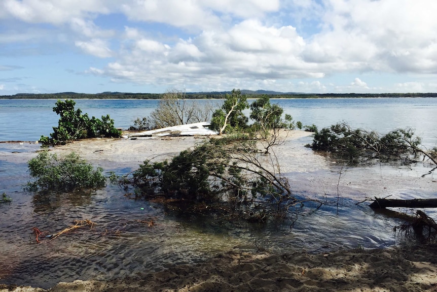 A submerged caravan in the sinkhole at Inskip Point