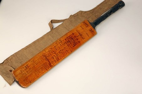 The cricket bat used by Sir Donald Bradman for autograph hunting.