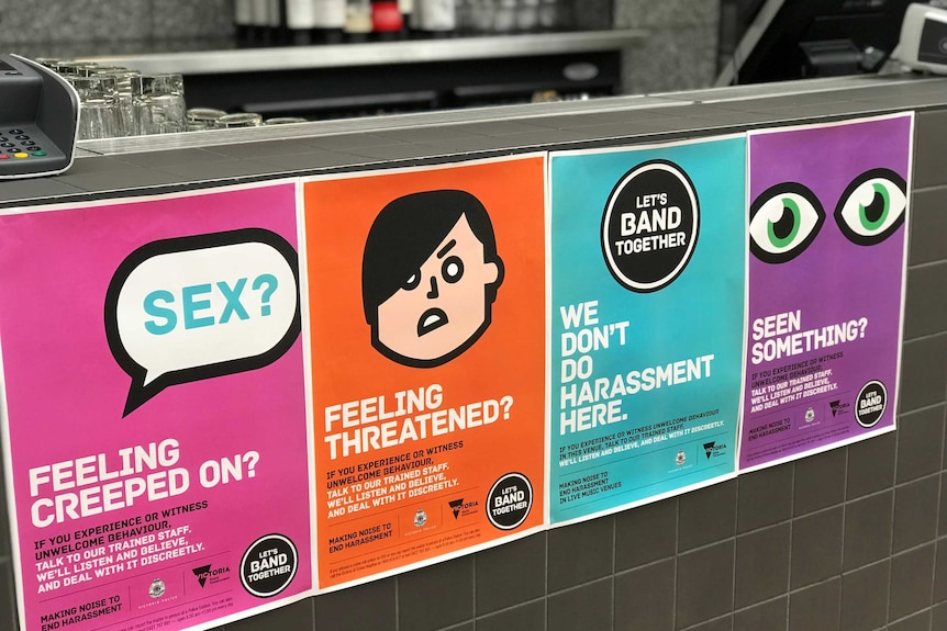A row of posters as part of a campaign to wipe out sexual harassment in live music venues.
