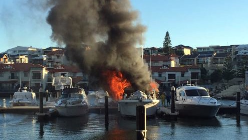 A boat on fire at Mindarie marina.