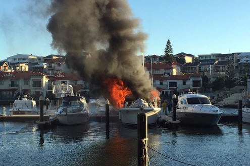 A boat on fire at Mindarie marina.