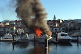 A boat on fire at Mindarie marina.