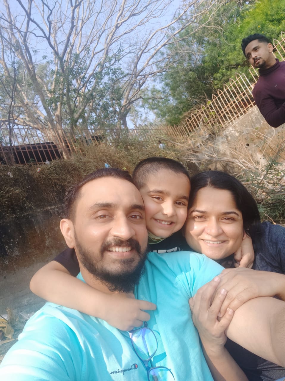 Virendrasinha Bhosale is embraced by his son and wife in this selfie taken after he returned home.