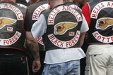Members of the motorcycle gang 'Hell's Angels' stand outside court