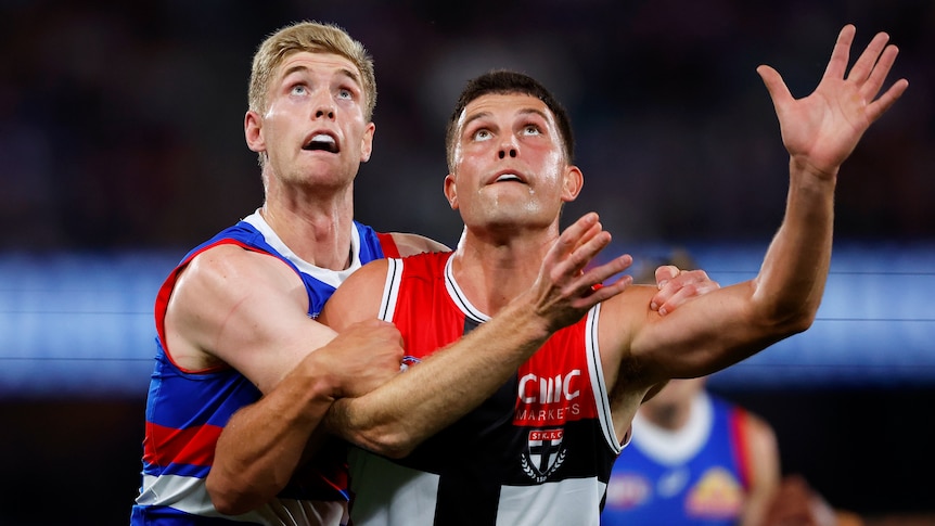 Tim English and Rowan Marshall compete at a ruck contest during a Bulldogs, Saints, AFL match