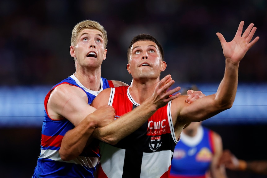 Tim English and Rowan Marshall compete at a ruck contest during a Bulldogs, Saints, AFL match