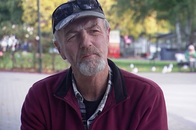 Homeless man Lionel, sitting on a bench in Hobart.