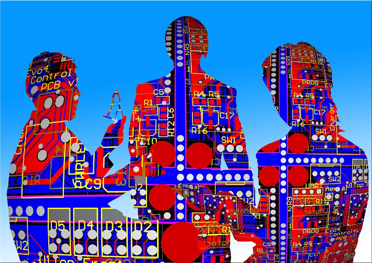 shape of three people in conversation - painted with computer circuits