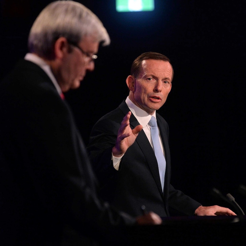 Tony Abbott looks at Kevin Rudd during the leaders debate.