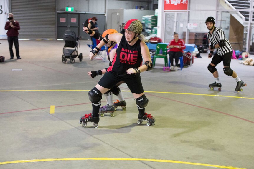 A competitor during a game of roller derby.