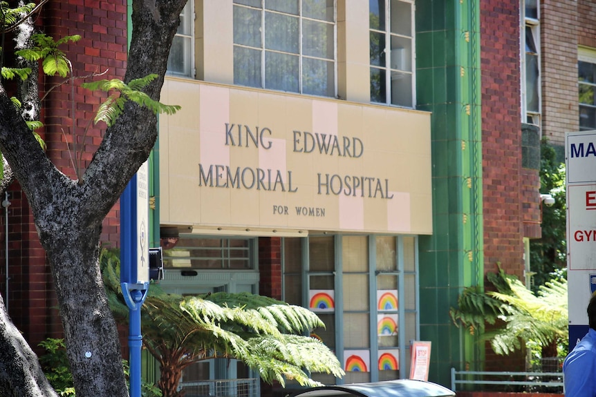A sign for King Edward Memorial Hospital outside the building.