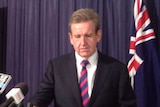 NSW Premier Barry O'Farrell resigns from his position at a press conference in Sydney.