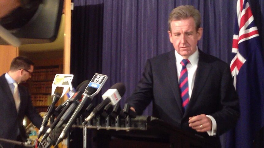 NSW Premier Barry O'Farrell resigns from his position at a press conference in Sydney.