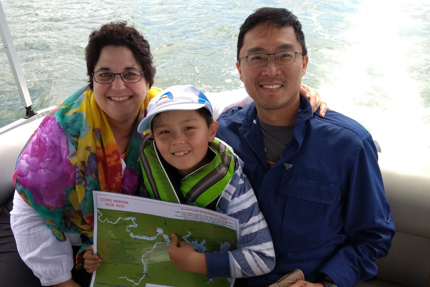 Rosemary Shapiro-Liu with her husband and son on a boat