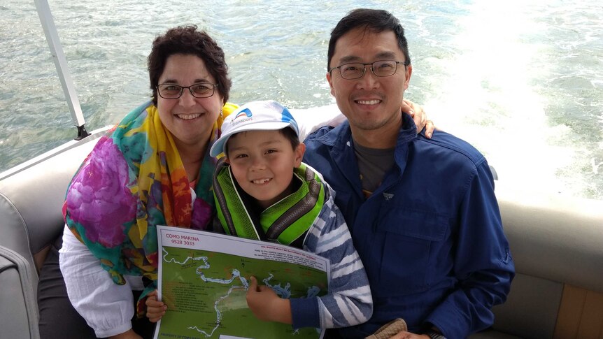 Rosemary Shapiro-Liu with her husband and son on a boat