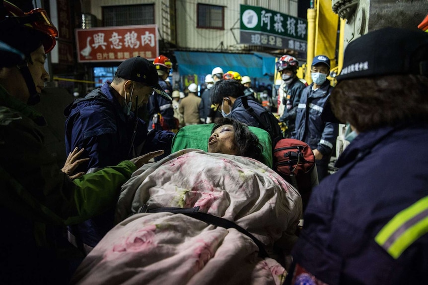 Taiwan earthquake survivor on stretcher