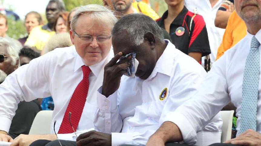 Kevin Rudd sits with Galarrwuy Yunupingu