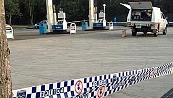 The man died at a service station on Chambers Flat Road about 2:30am (AEST).