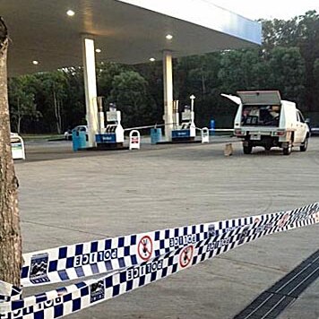 The man died at a service station on Chambers Flat Road about 2:30am (AEST).