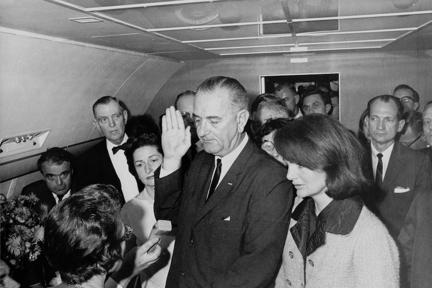 US President Lyndon Johnson being inaugurated on the deck of Air Force One