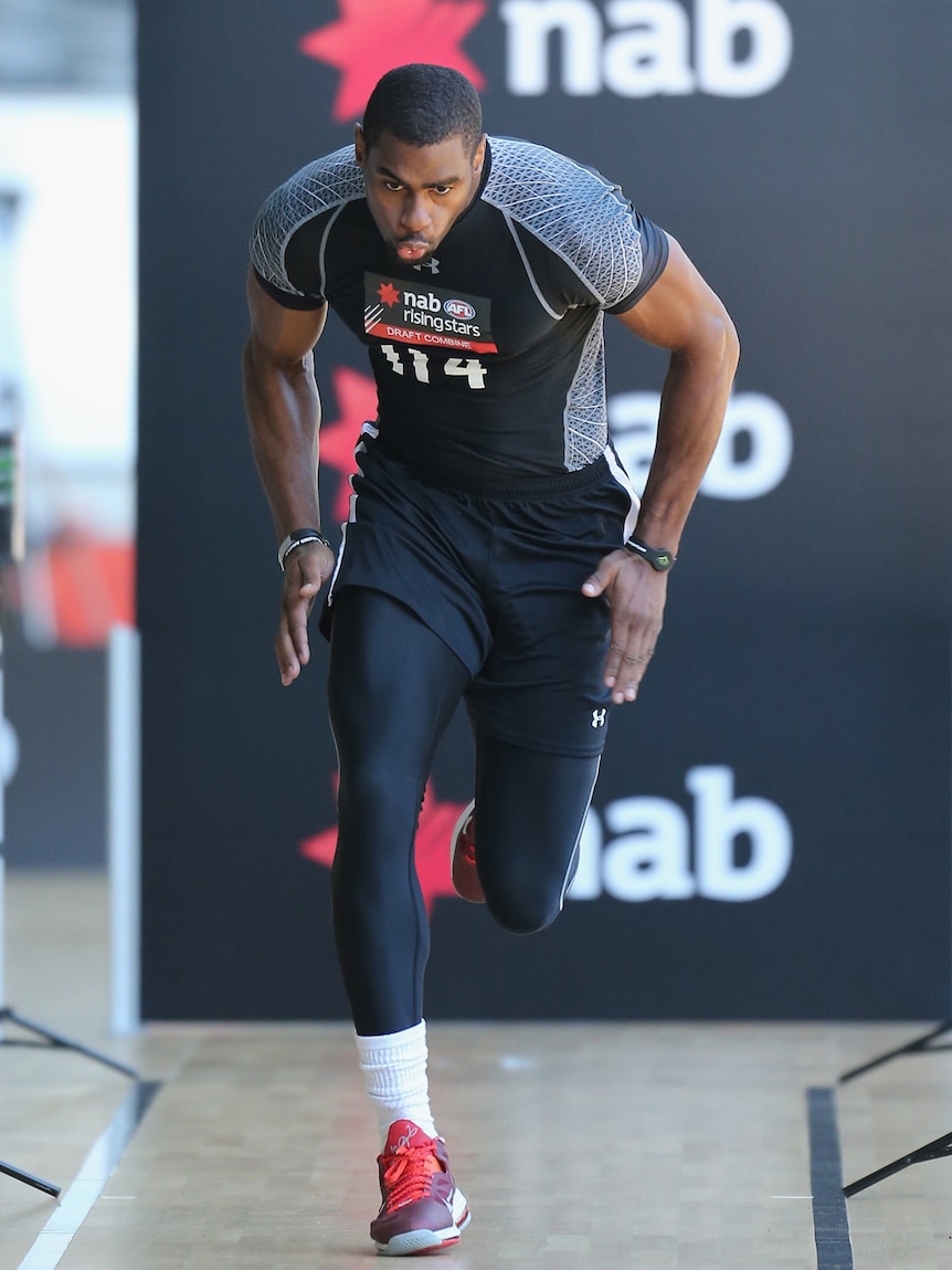 American Eric Wallace runs at the AFL Draft Combine in October.
