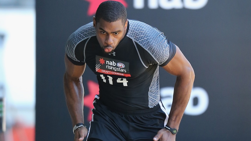 American Eric Wallace runs at the AFL Draft Combine in October.