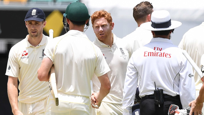Cameron Bancroft shakes hands with Jonny Bairstow on the field after the match.