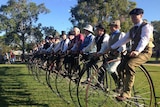 Brett Richardson and his group of Penny Farthings line up in Brisbane.